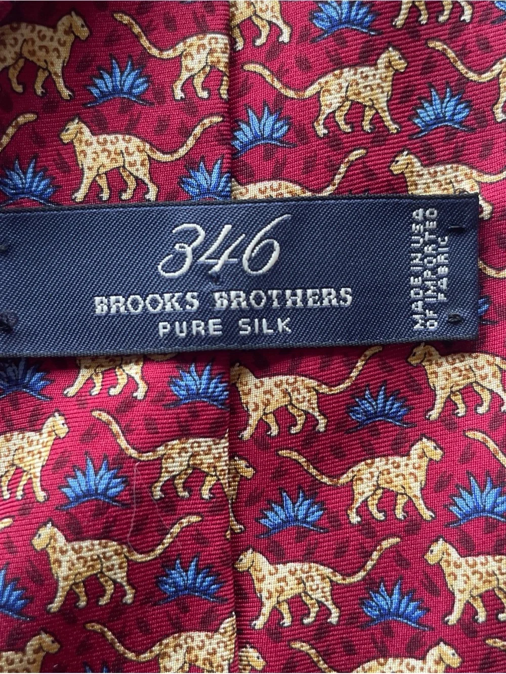 Brooks Brothers Red Silk Tie with Yellow Animal Motif and Blue Accents